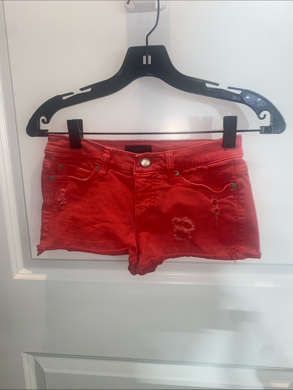 Women's Red Distressed Bebe Denim Shorts